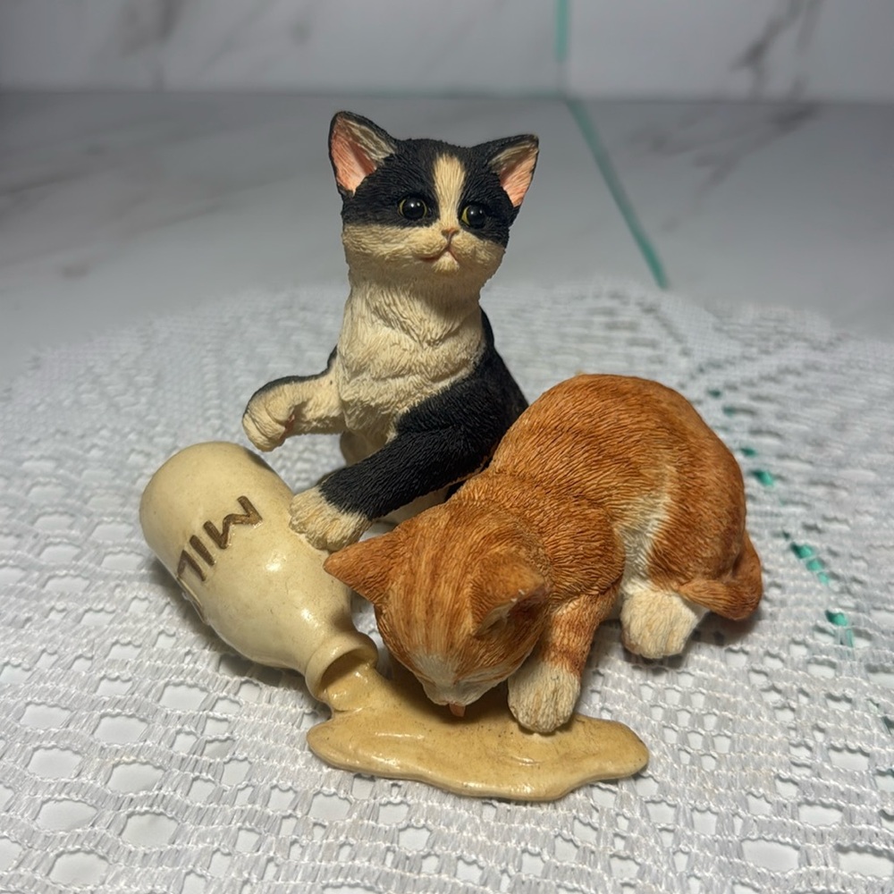 Lenox figurine titled Caught in the act.
